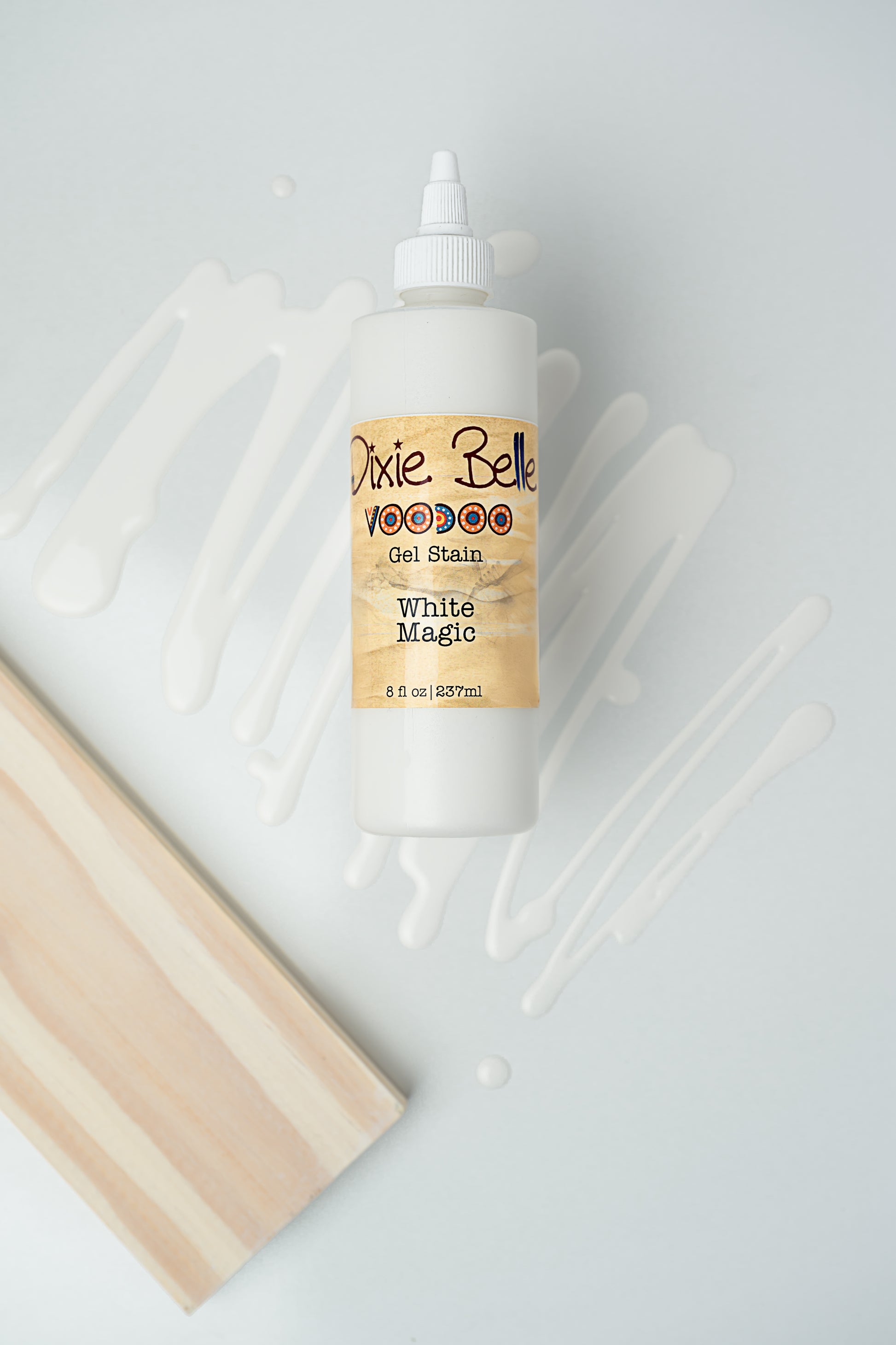 Dixie Belle VooDoo Gel Stain White Magic – 8 fl oz squeeze bottle with white gel swipes on light background