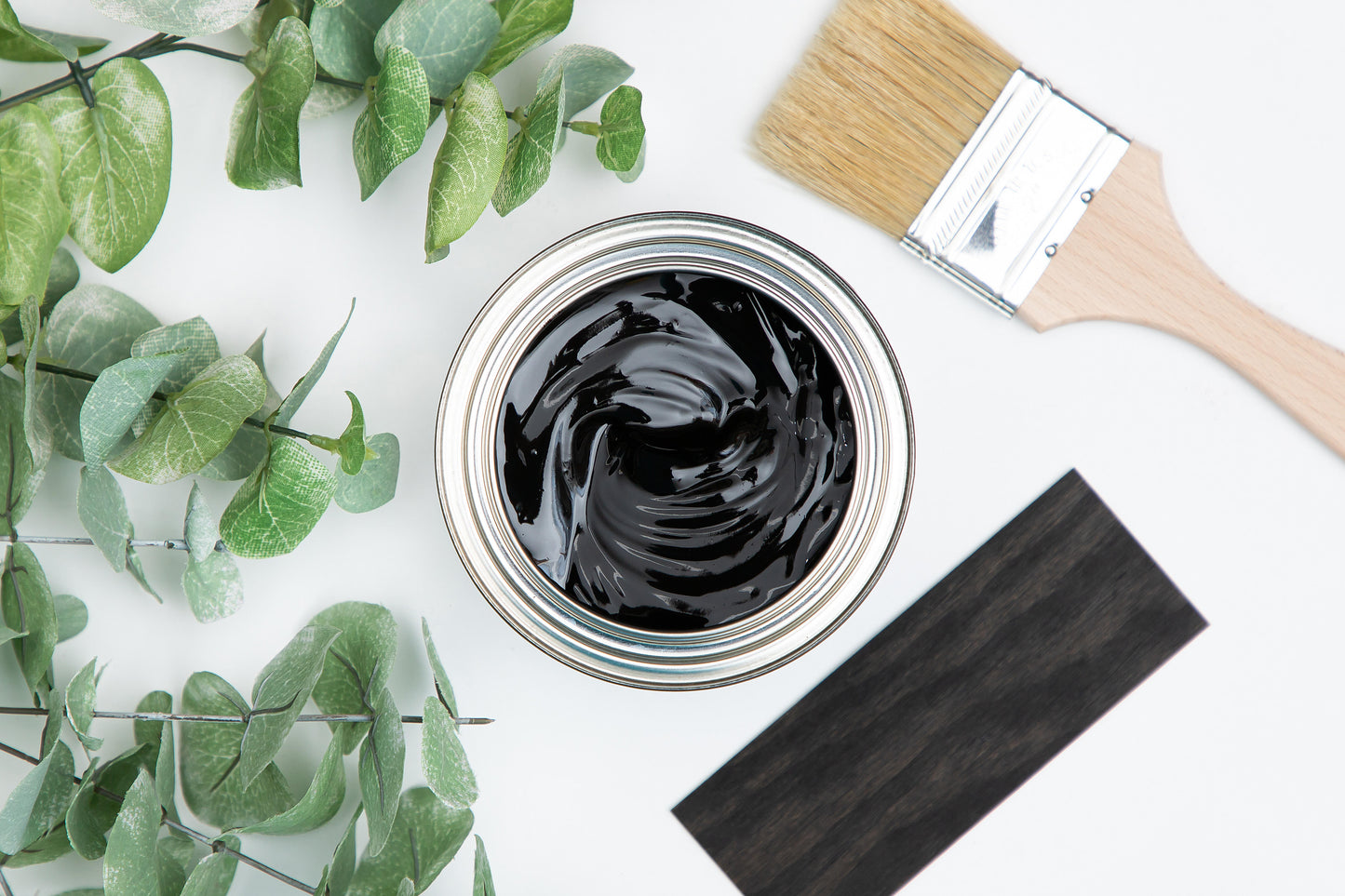 Dixie Belle No Pain Gel Stain Colonial Black open can showing deep black color with wood swatch