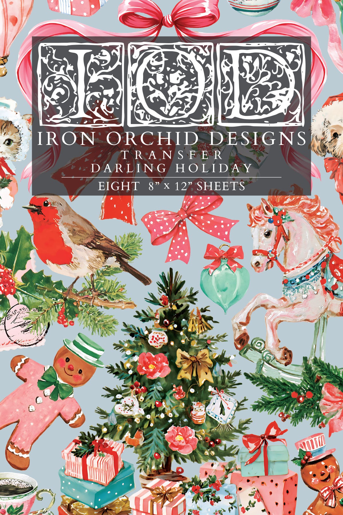 IOD Darling Holiday Transfer front packaging — pastel retro Christmas design with Santa, gingerbread men, carousel horse, robin, and decorated tree