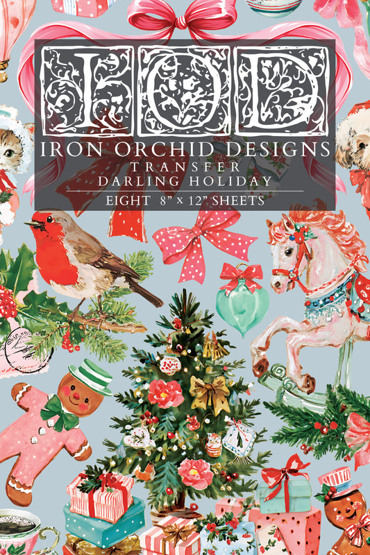 IOD Darling Holiday Transfer front packaging — pastel retro Christmas design with Santa, gingerbread men, carousel horse, robin, and decorated tree