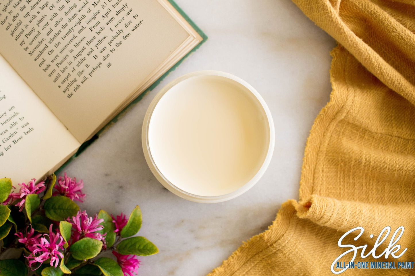 Sunkissed Dixie Belle Silk All-In-One Mineral Paint in soft warm ivory with golden glow